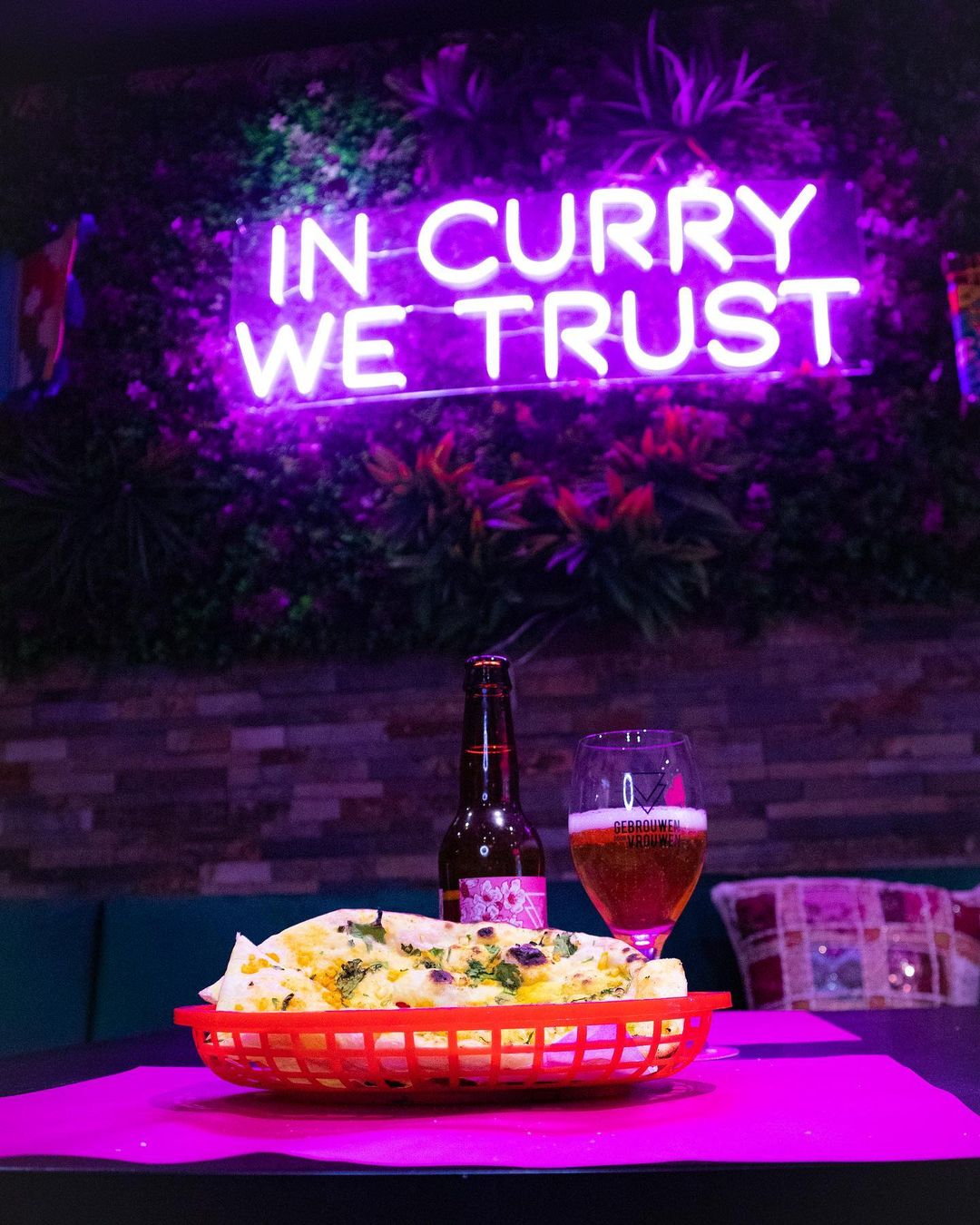 vegan food with in curry we trust sign